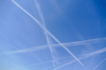 Photo of Airplanes crossing paths in the airの写真素材