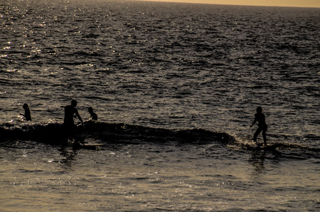 Silhouette Surfer at Sunset in Tenerife Canary Island Spainの写真素材