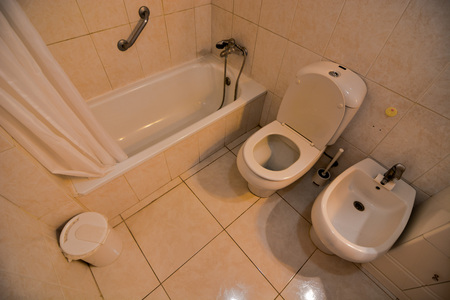 Pure white bathroom interior with separate bathtubの写真素材