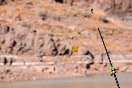 Conceptual Photo Picture Fishing with rod on a lakeの写真素材