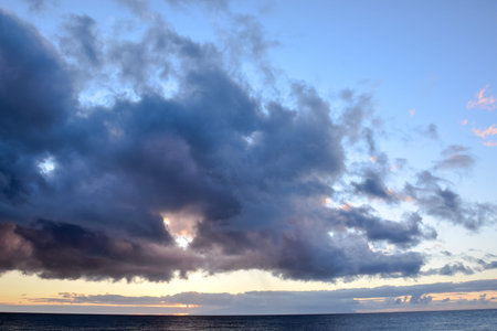 Cloudscape, Colored Clouds at Sunset near the Ocean