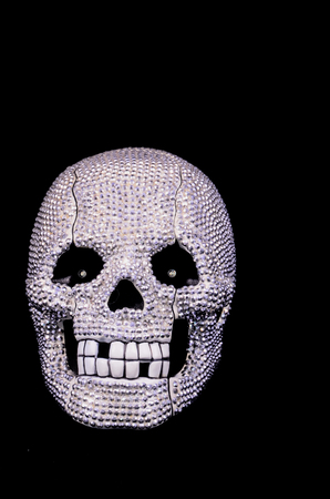 Diamond Skull on a Black Background with Broken Teethの写真素材
