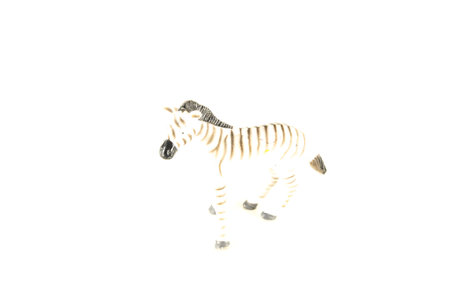 Close-up of zebra plastic animal Object on a White Backgroundの写真素材