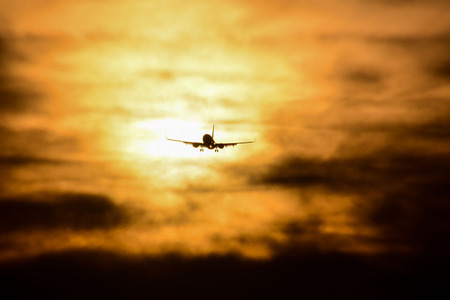 Photo picture Silhouette airplane flying on the skyの写真素材