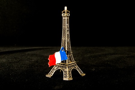 Eiffel Tower toy miniature on black backgroundの写真素材