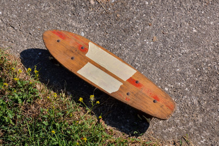 Photo picture of a Wooden 70's skate board skateboardの写真素材