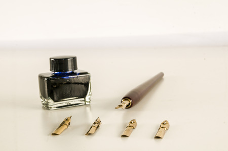Photo picture of an antique ink fountain pen backgroundの写真素材