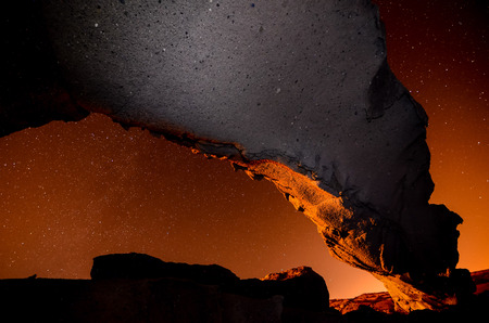 Night Sky Picture of a Basaltic Natural Archの写真素材