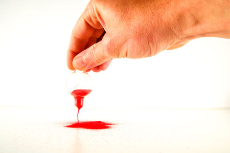 Close-up of broken hourglass Object on a White Background