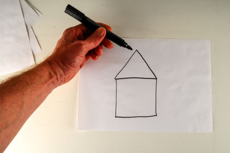 Close-up of sheet with drawing Object on a White Background
