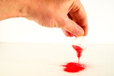 Close-up of broken hourglass Object on a White Background