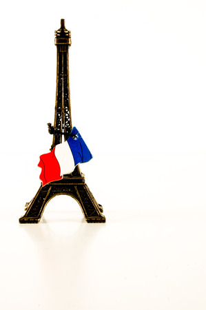 Eiffel Tower toy miniature on white backgroundの写真素材