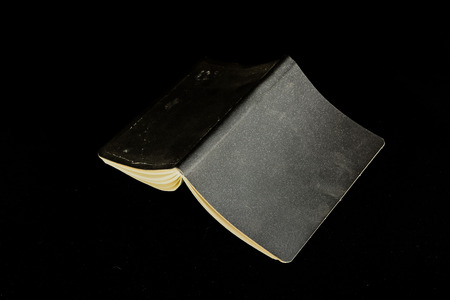Close-up of note book Object on a Black Backgroundの写真素材