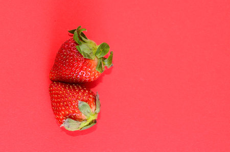 Fresh Ripe Strawberry Fruit on a Colored Background