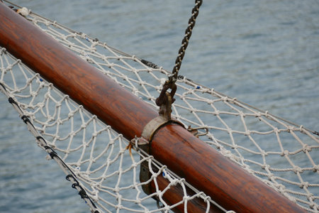 Wooden sailboat on the blue mediterranean sea. Details of a classic beautiful sailing yacht with...