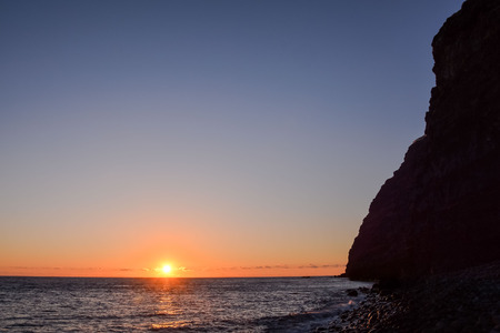 Sun Setting on the Atlantic Ocean in Tenerife Canary Island Spainの写真素材
