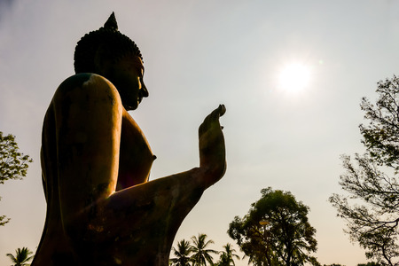 silhouette of man with gun at sunset, beautiful photo digital pictureの写真素材