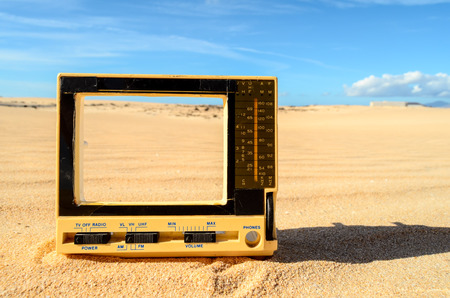 Conceptual Photo Picture of a Television Object in the Dry Desertの写真素材
