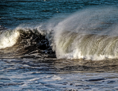 Big Blue Wave Breaks in the Atlantic Oceanの写真素材