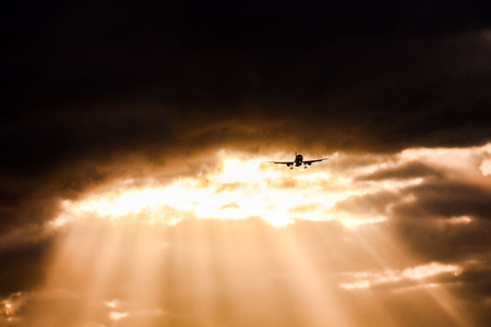 Photo picture Silhouette airplane flying on the skyの写真素材