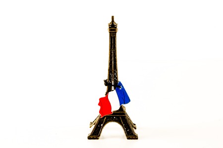 Eiffel Tower toy miniature on white backgroundの写真素材