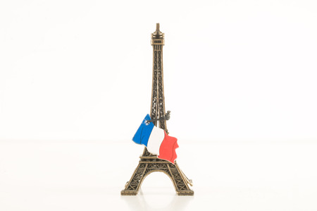 Eiffel Tower toy miniature on white backgroundの写真素材