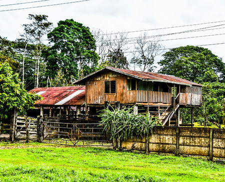 old wooden house in the village, photo as a background, digital imageの写真素材
