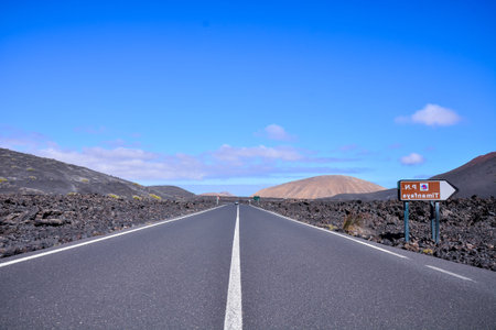 Long Empty Desert Asphalt Road in Canary Islands Spain