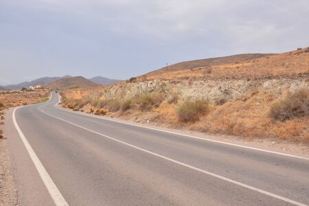 Long Empty Desert Asphalt Road in Canary Islands Spainの写真素材