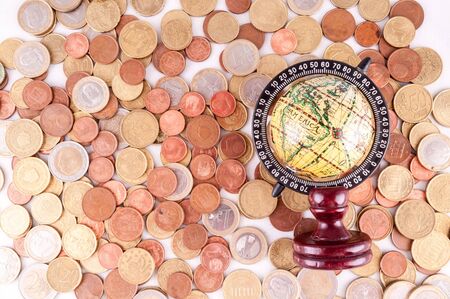 Picture of a Business Money Concept Idea Globe and Coinsの写真素材