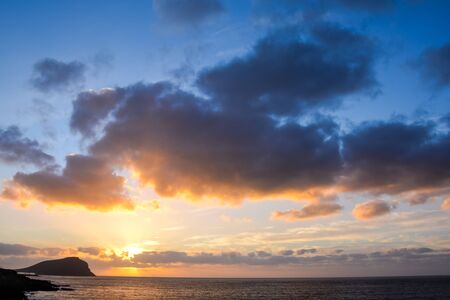 Sun Setting on the Atlantic Ocean in Tenerife Canary Island Spainの写真素材