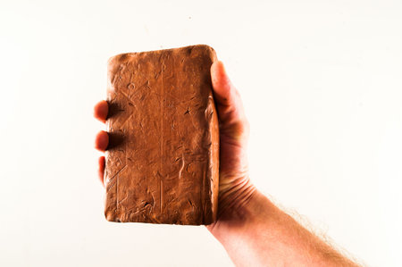 photo picture of Brown Plasticine loaf textured background
