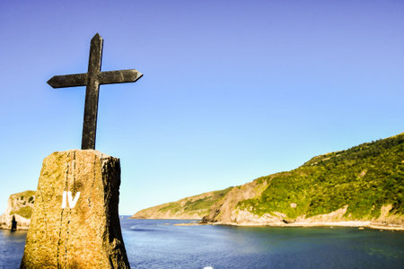 cross in mountains, photo as a background, digital image