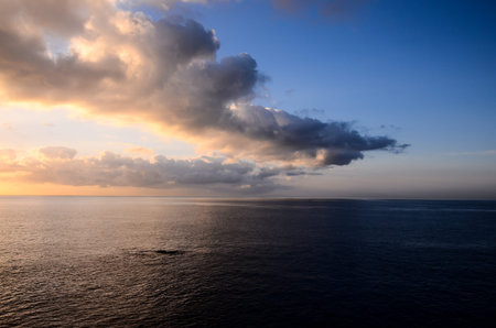 Cloudscape, Colored Clouds at Sunset near the Ocean