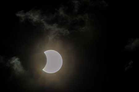 Partial Solar Eclipse on a Cloudy Day