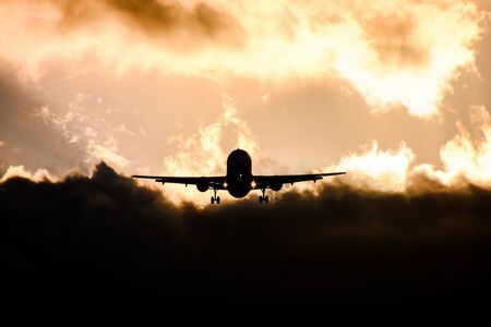 Photo picture Silhouette airplane flying on the skyの写真素材