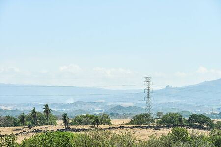 high voltage tower and blue sky, photo as a background, digital imageの写真素材