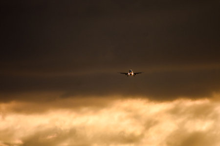 Photo picture Silhouette airplane flying on the sky