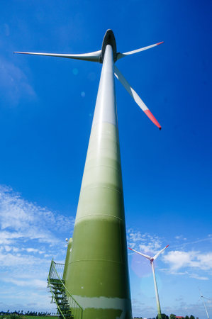 wind turbine against blue sky, beautiful photo digital picture