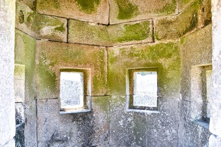 old window in stone wall, photo as a background, digital imageの写真素材
