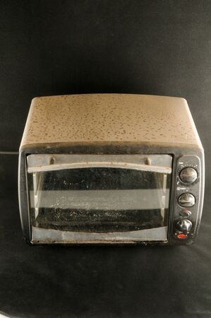 small electric oven isolated in the kitchenの写真素材