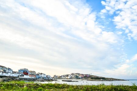 landscape with houses and blue sky, photo as a background, digital imageの写真素材