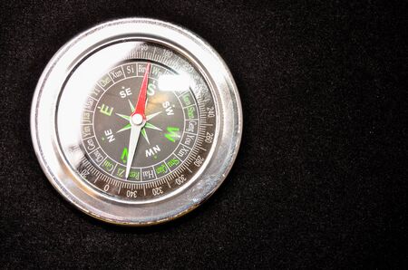 Vintage Classic Compass on a Black Backgroundの写真素材
