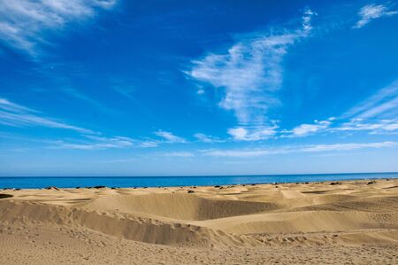 sand dunes and blue sky, photo as a backgroundの写真素材