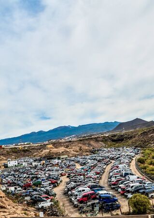 Scrap Yard With Pile Of Crushed Cars in tenerife canary islands spainの写真素材