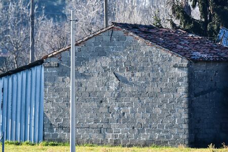 old wooden fence on a background of blue sky, photo as a background, digital imageの写真素材