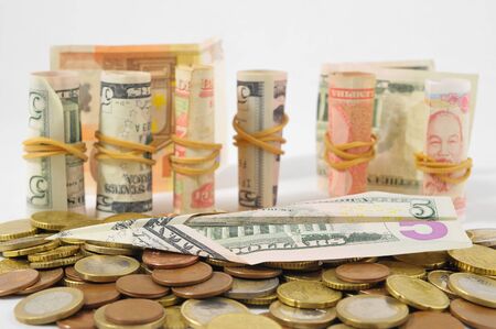 Flying Money Concept a Dollar Airplane and Coinsの写真素材