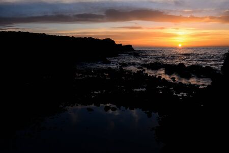 Photo Picture of The Sun Setting in the Seaの写真素材