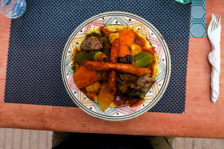 grilled steak with potatoes and vegetables, photo as background