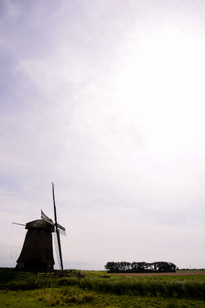 Photograph of a Classic Vintage Windmill in Hollandの写真素材